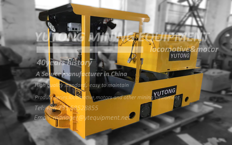 What is the adhesion coefficient of the mining electric locomotive?