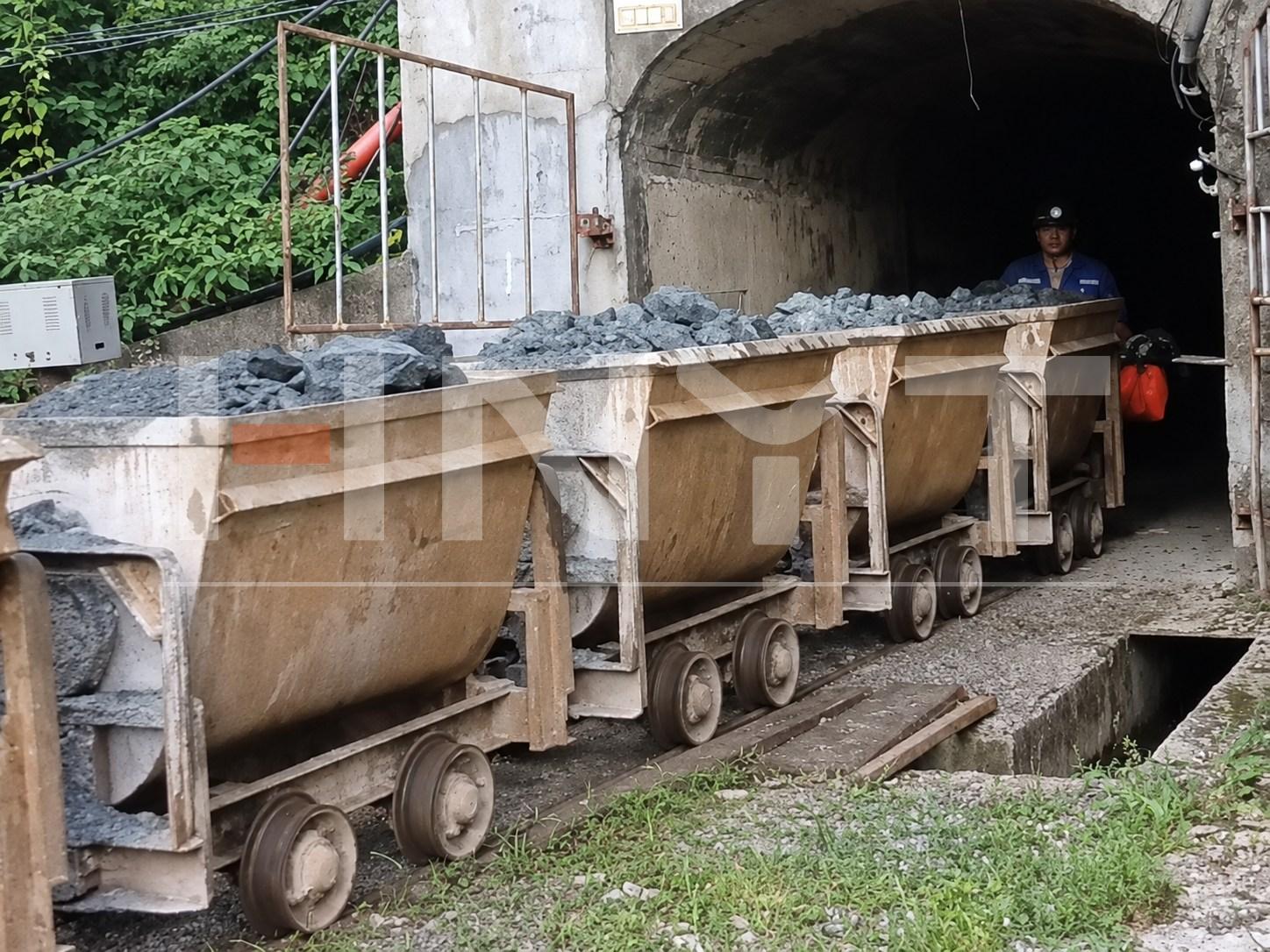 loaded-tipping-mine-wagons-tunnel-exit.jpg