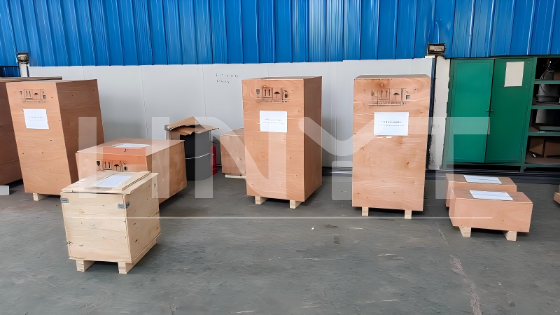 Two 2.5 Ton Mining Electric Locomotives and One 5 Ton Unit Shipped to a South American Gold Mine(图2) Locomotive parts packed in labeled wooden cases before loading.png